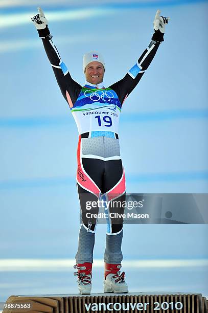 Aksel Lund Svindal of Norway celebrates gold during the flower ceremony for the men's Super-G alpine skiing held at the on day 8 of the Vancouver...