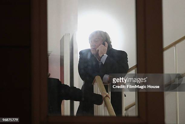 Actor Gerard Depardieu speaks on his phone after he attended the 'Mammuth' Photocall during day nine of the 60th Berlin International Film Festival...