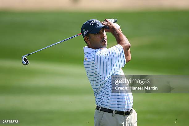 Jeev Milkha Singh of India plays his second shot on the second hole during round three of the Accenture Match Play Championship at the Ritz-Carlton...