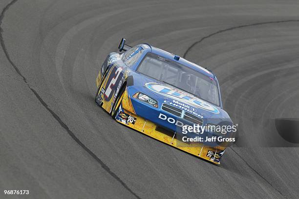 Kurt Busch drives the Miller Lite Dodge during practice for the NASCAR Sprint Cup Series Auto Club 500 at Auto Club Speedway on February 19, 2010 in...
