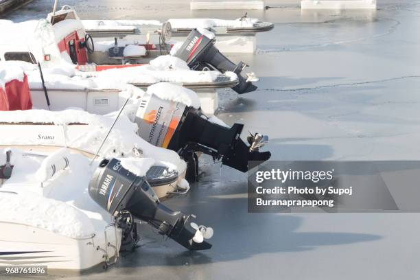 eskifjordur,iceland - march 07,2018 : ship propeller at harbor of eskifjordur in east iceland - schiffsschraube stock-fotos und bilder
