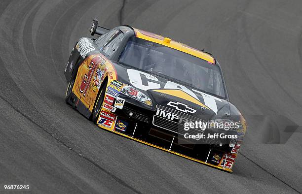 Jeff Burton drives the CAT Chevrolet during practice for the NASCAR Sprint Cup Series Auto Club 500 at Auto Club Speedway on February 19, 2010 in...