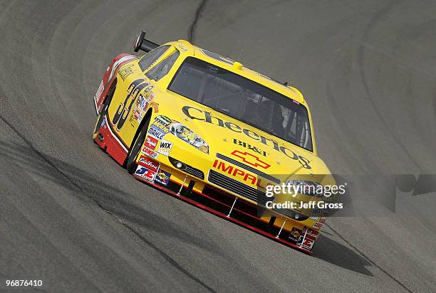 Clint Bowyer drives the Cheerios/Hamburger Helper Chevrolet during practice for the NASCAR Sprint Cup Series Auto Club 500 at Auto Club Speedway on...