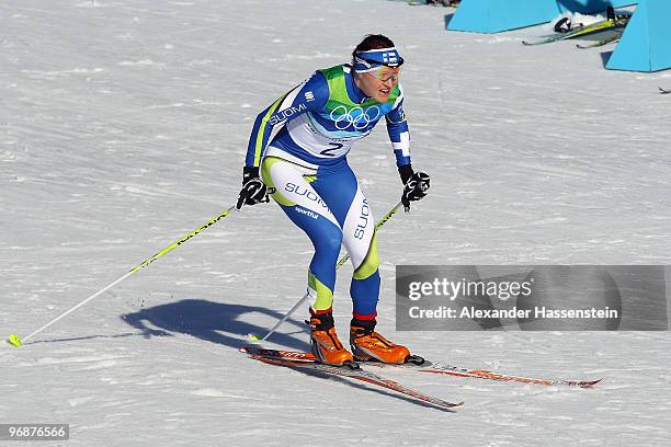 Aino-Kaisa Saarinen of Finland during the Ladies' 15 km Pursuit race on day 8 of the 2010 Vancouver Winter Olympics at Whistler Olympic Park...