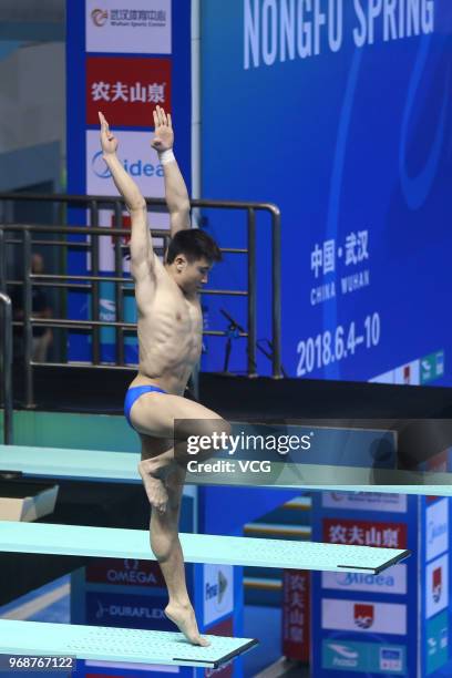 Cao Yuan of China competes in the Men's 3m Springboard on day two of the 21st FINA Diving World Cup 2018 at Natatorium of Wuhan Sports Center on June...