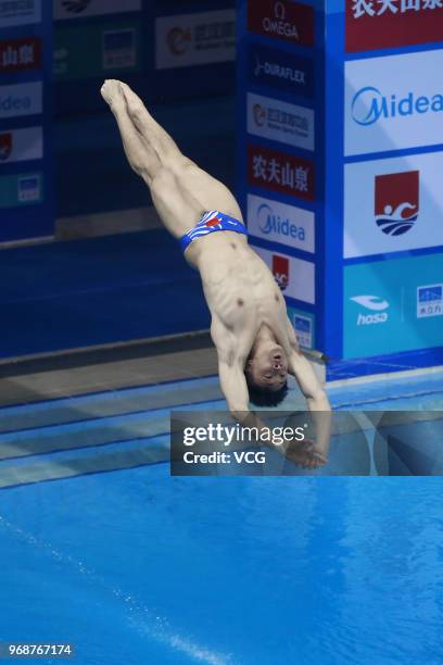 Cao Yuan of China competes in the Men's 3m Springboard on day two of the 21st FINA Diving World Cup 2018 at Natatorium of Wuhan Sports Center on June...