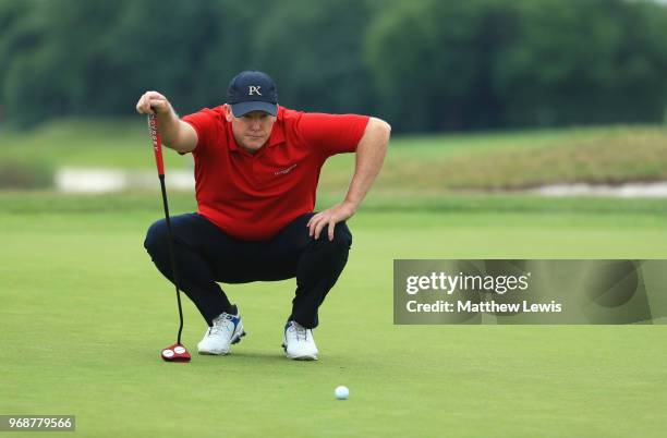 Marcus Fraser of Australia lines up a putt on the 2nd green during day one of the 2018 Shot Clock Masters at Diamond Country Club on June 7, 2018 in...