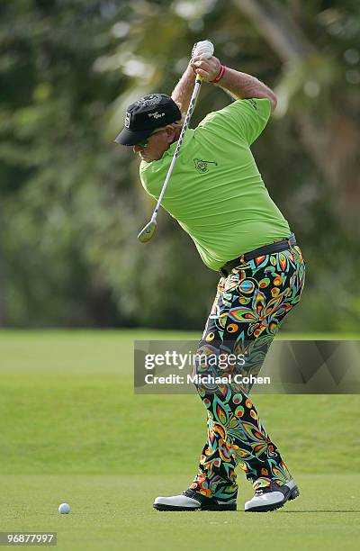John Daly hits a tee shot during the second round of the Mayakoba Golf Classic at El Camaleon Golf Club held on February 19, 2010 in Riviera Maya,...