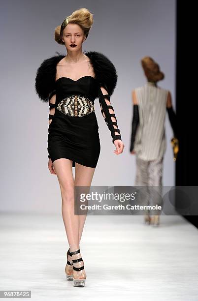 Model walks down the catwalk during the Sass & Bide fashion show during London Fashion Week at the BFC Show Space at Somerset House on February 19,...