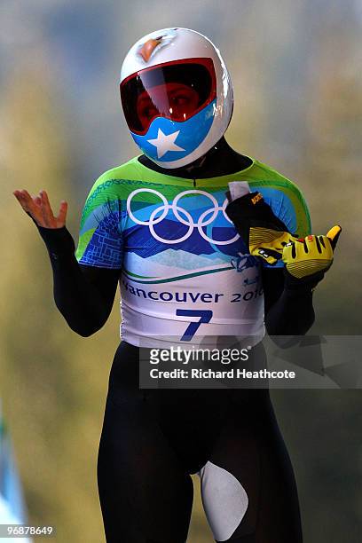 Katie Uhlaender of the United States reacts after she completed her run in the women's skeleton third heat on day 8 of the 2010 Vancouver Winter...