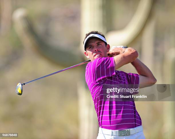 Charl Schwartzel of South Africa plays his tee shot on the 17th hole during round three of the Accenture Match Play Championship at the Ritz-Carlton...