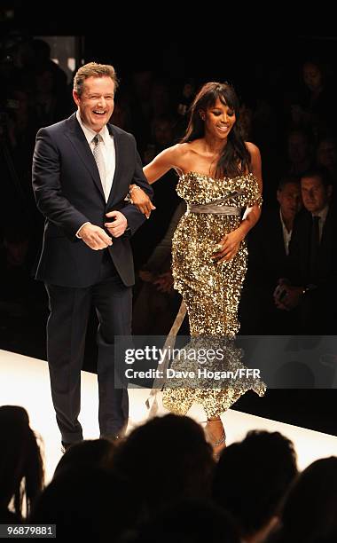 Piers Morgan and Naomi Campbell walk down the catwalk at Naomi Campbell's Fashion For Relief Haiti London 2010 Fashion Show at Somerset House on...