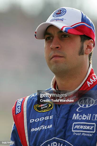 Sam Hornish Jr., driver of the Auto Club Dodge, stands on pit road during qualifying for the NASCAR Sprint Cup Series Auto Club 500 at Auto Club...