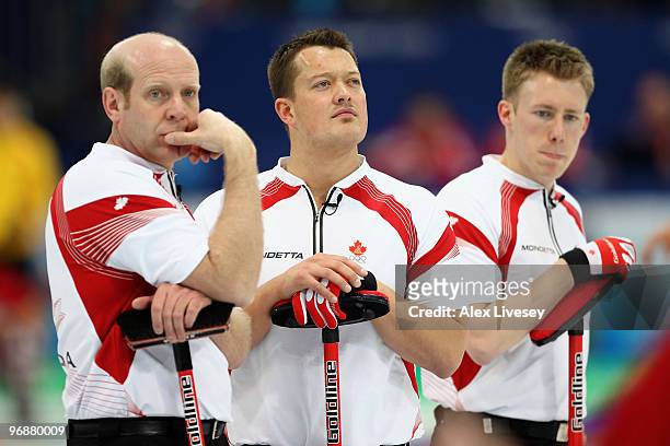 Kevin Martin, Ben Herbert and Marc Kennedy of Canada look on during the Men's Curling Round Robin match between Denmark and Canada on day 8 of the...