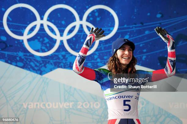 Amy Williams of Great Britain and Northern Ireland celebrates celebrates winning the gold medal during the flower cermony for the women's skeleton...
