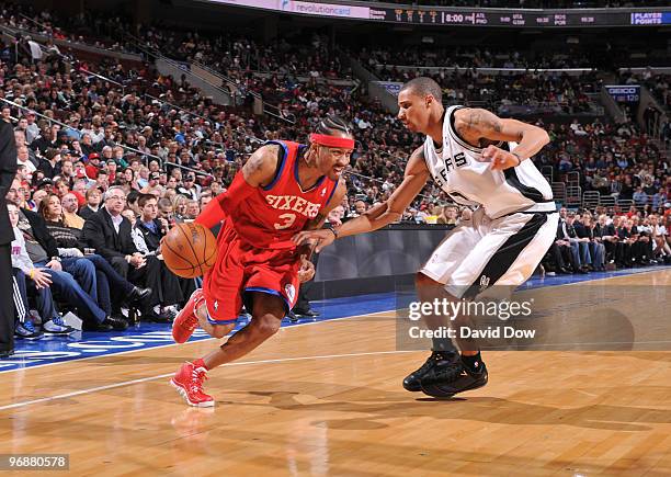 Allen Iverson of the Philadelphia 76ers drives against George Hill of the San Antonio Spurs during the game on February 19, 2010 at the Wachovia...