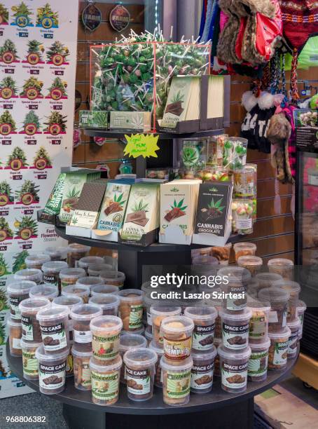 Sweats with cannabis are for sale in front of a coffee shop at the Nieuwendijk Street on May 27, 2018 in Amsterdam, Netherlands. Coffee shops are...
