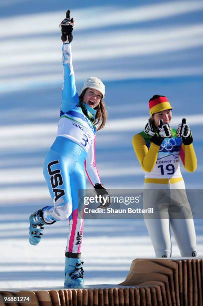 Julia Mancuso of The United States celebrates silver during the flower ceremony for the women's super combined alpine skiing on day 7 of the...