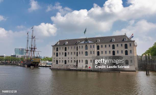 General view of the National Maritime Museum beside the Dijksgracht Canal on May 30, 2018 in Amsterdam, Netherlands. The ship moored alongside the...