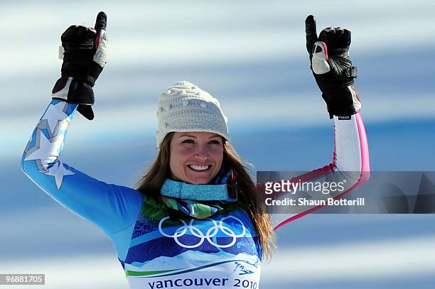 Julia Mancuso of The United States celebrates silver during the flower ceremony for the women's super combined alpine skiing on day 7 of the...