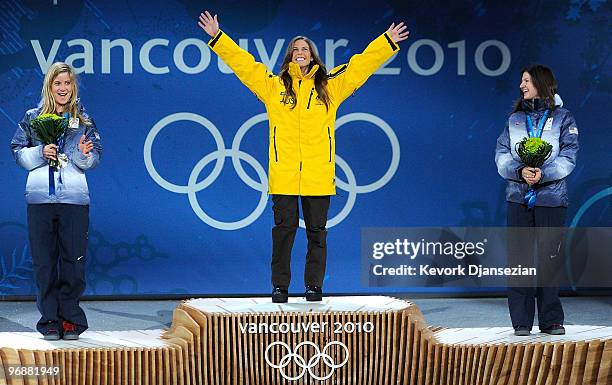 Hannah Teter of United States celebrates winning Silver, Torah Bright of Australia Gold, and Kelly Clark of United States Bronze during the medal...