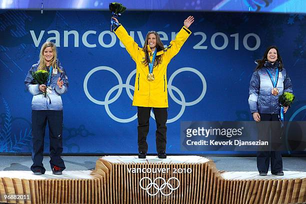 Hannah Teter of United States celebrates winning Silver, Torah Bright of Australia Gold, and Kelly Clark of United States Bronze during the medal...