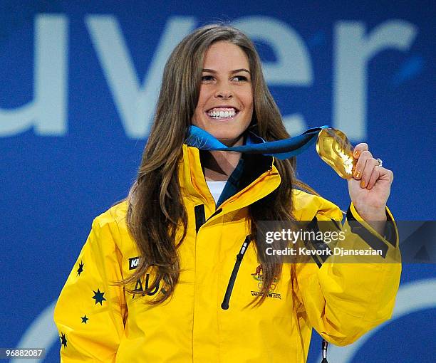 Torah Bright of Australia celebrates receiving the gold medal during the medal ceremony for the women's halfpipe on day 8 of the Vancouver 2010...