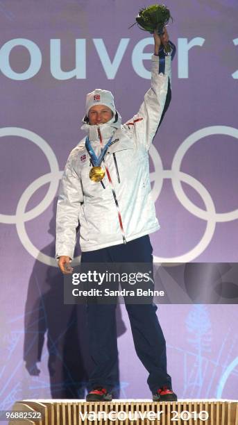 Aksel Lund Svindal of Norway celebrates his gold medal during the medal ceremony for the men's Super-G on day 8 of the Vancouver 2010 Winter Olympics...