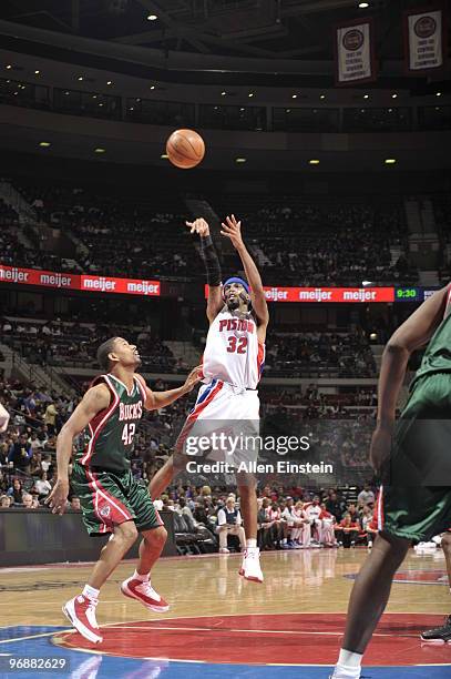 Richard Hamilton of the Detroit Pistons goes up for a shot attempt against Charlie Bell of the Milwaukee Bucks in a game at the Palace of Auburn...