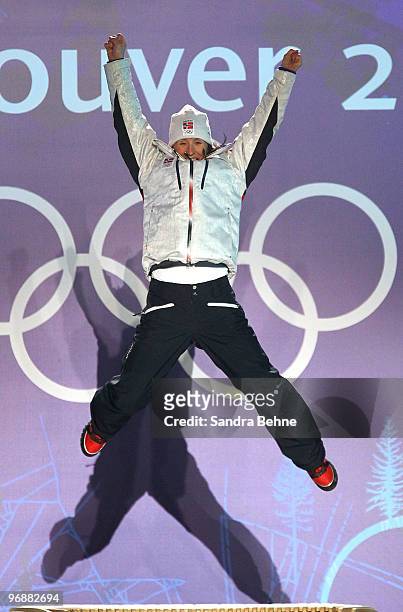 Aksel Lund Svindal of Norway celebrates his gold medal during the medal ceremony for the men's Super-G on day 8 of the Vancouver 2010 Winter Olympics...