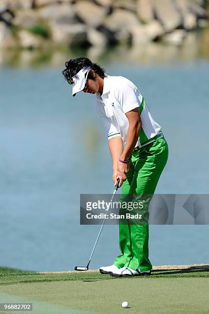 Ryo Ishikawa of Japan hits his putt on the third green during the third round of the World Golf Championships-Accenture Match Play Championship at...