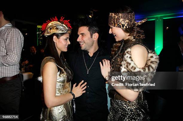 Actor Marc Eric Terenzi and hostessen attend the 'Tele 5 Director's Cut`during the 60th Berlin Film Festival at Puro Lounge on February 19, 2010 in...