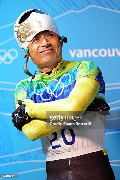 Kazuhiro Koshi of Japan reacts after he completed his run in the men's skeleton fourth heat on day 8 of the 2010 Vancouver Winter Olympics at the...