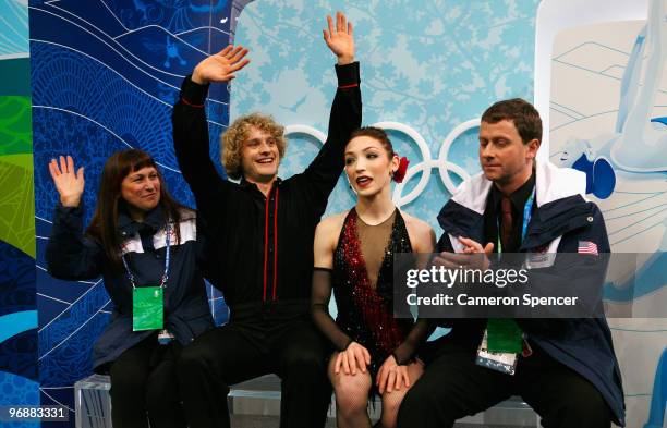 Meryl Davis and Charlie White of United States react in the kiss and cry area in the Figure Skating Compulsory Ice Dance on day 8 of the Vancouver...