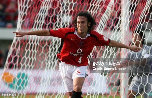 Marcus Tulio Tanaka of Urawa Red Diamonds celebrates scoring the opening goal during the J.League Division 1 match between Urawa Red Diamonds and...