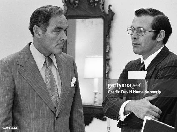 White House Chief of Staff Alexander Haig meets with Donald Rumsfeld, head of President Gerald Ford's transition team outside the Oval Office at the...