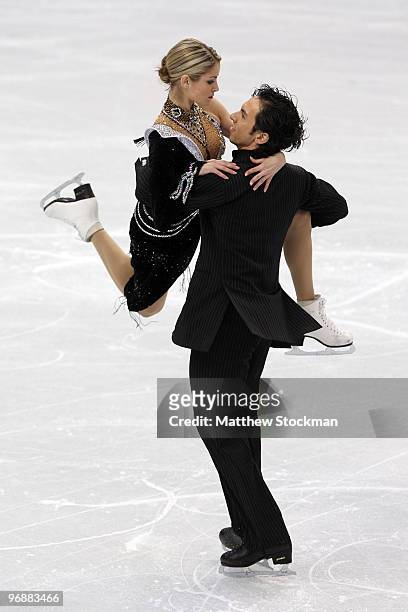 Tanith Belbin and Benjamin Agosto of United States compete in the Figure Skating Compulsory Ice Dance on day 8 of the Vancouver 2010 Winter Olympics...