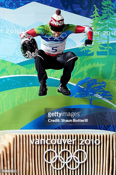 Jon Montgomery of Canada celebrates the gold medal during the flower ceremony for the men's skeleton on day 8 of the 2010 Vancouver Winter Olympics...