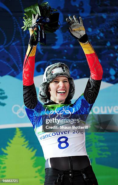 Anja Huber of Germany celebrates winning the bronze medal during the flower ceremony for the women's skeleton on day 8 of the 2010 Vancouver Winter...