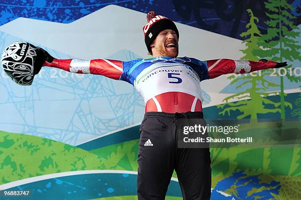 Jon Montgomery of Canada celebrates the gold medal during the flower ceremony for the men's skeleton on day 8 of the 2010 Vancouver Winter Olympics...