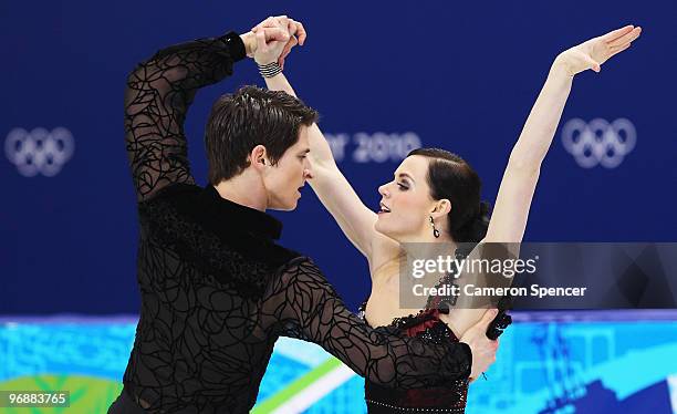 Tessa Virtue and Scott Moir of Canada compete in the Figure Skating Compulsory Ice Dance on day 8 of the Vancouver 2010 Winter Olympics at the...