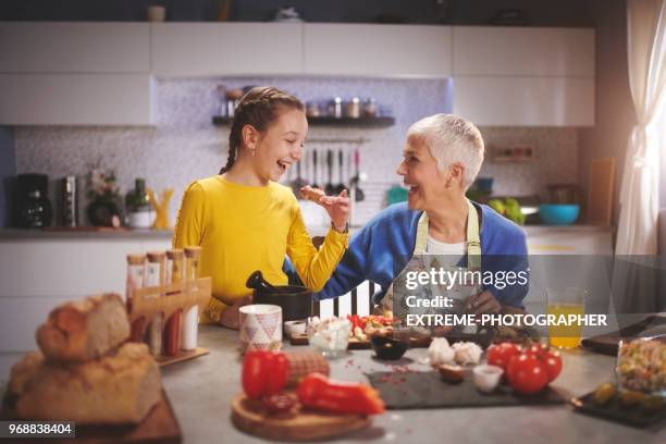 family in the kitchen - extreme dieting stock pictures, royalty-free photos & images