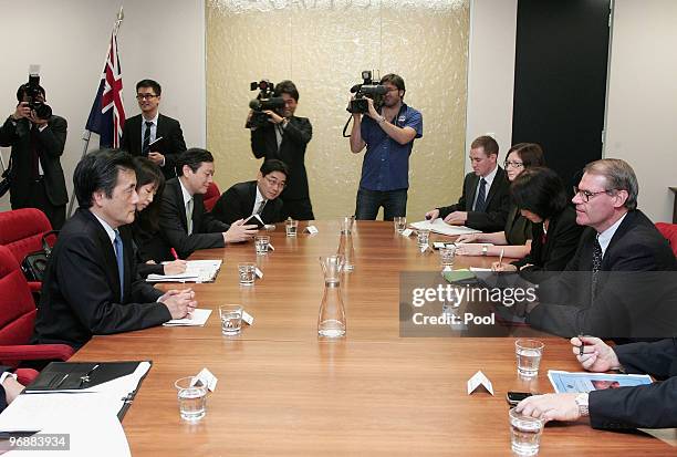 Japan's Minister For Foreign Affairs Katsuya Okada talks with Australian Minister for Defence John Faulkner at the Commonwealth Parliamentary Offices...