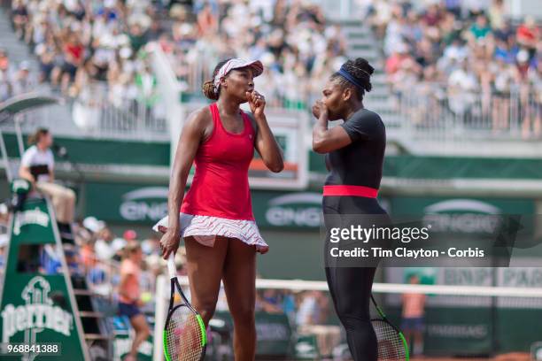 June 3. French Open Tennis Tournament - Day Eight. Serena Williams and Venus Williams of the United States in action against Andreja Klepac of...