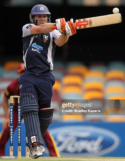 Aiden Blizzard of the Bushrangers hits the ball during the Ford Ranger Cup match between the Queensland Bulls and the Victorian Bushrangers at The...