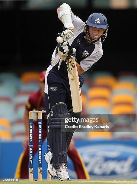 Chris Rogers of the Bushrangers bats during the Ford Ranger Cup match between the Queensland Bulls and the Victorian Bushrangers at The Gabba on...