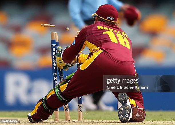 Chris Hartley of the Bulls runs out Aiden Blizzard of the Bushrangers during the Ford Ranger Cup match between the Queensland Bulls and the Victorian...