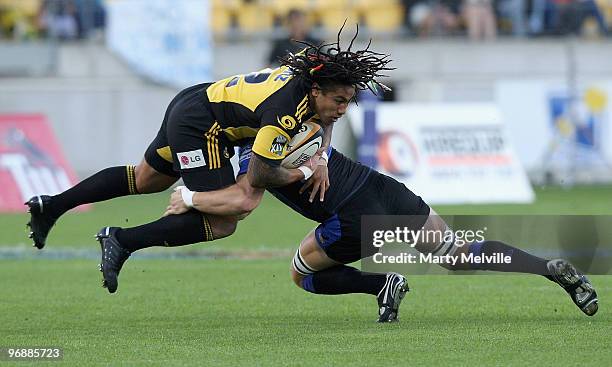 Ma'a Nonu of the Hurricanes is tackled by Ben McCalman of the Force during the round two Super 14 match between the Hurricanes and the Western Force...
