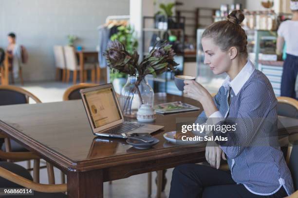 business woman in cafe - pastry shoes stock pictures, royalty-free photos & images