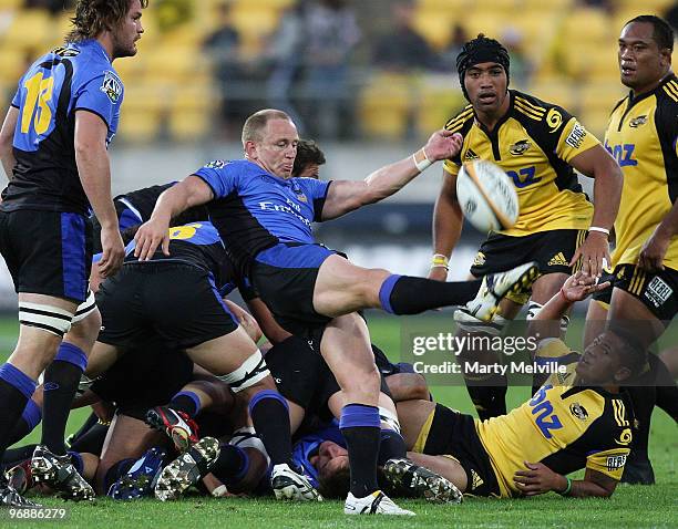 Brett Sheehan of the Force kicks the ball during the round two Super 14 match between the Hurricanes and the Western Force at Westpac Stadium on...